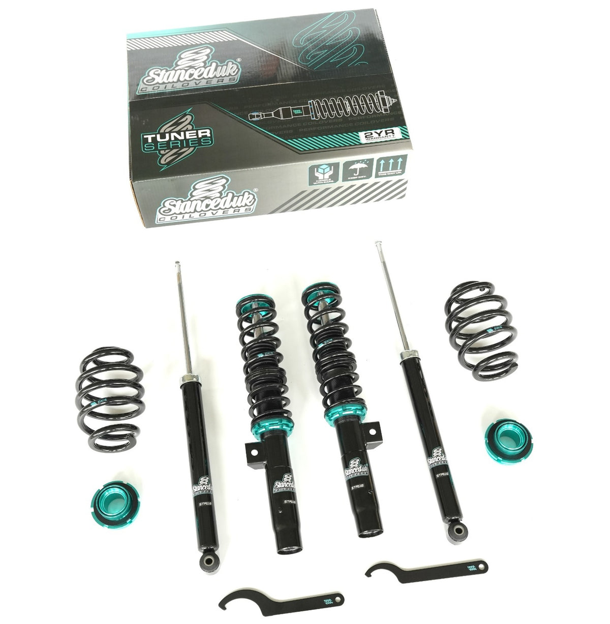 Stanced UK suspension kit with springs and shocks on a white background