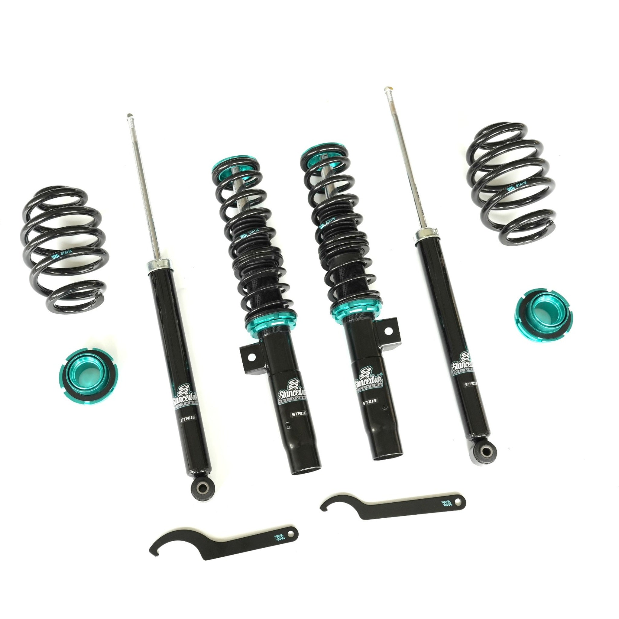 Car suspension components including shock absorbers and springs on a white background