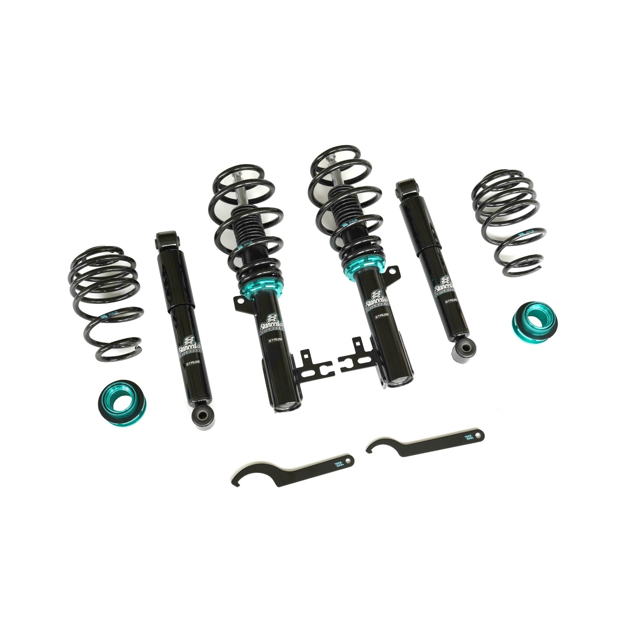 Full view of Stanced UK STA126 coilover kit – front and rear suspension components with tools, finished in black and teal
